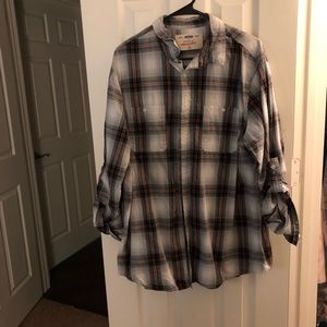 Men’s plaid long sleeve button up shirt.